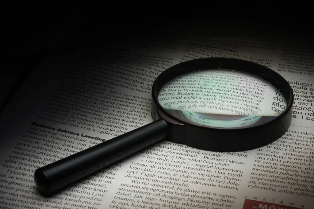Free magnifying glass newspaper photo